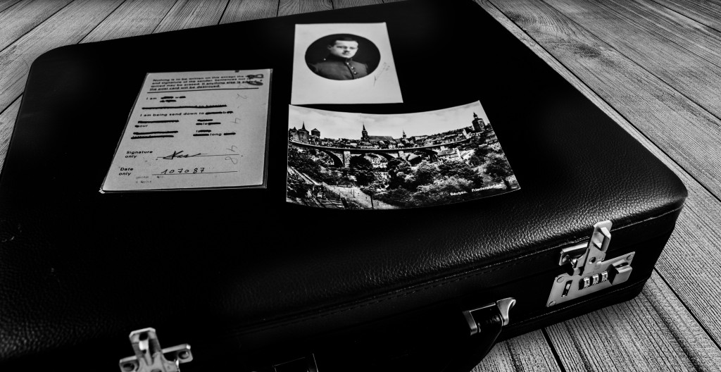 old suitcase with postcards